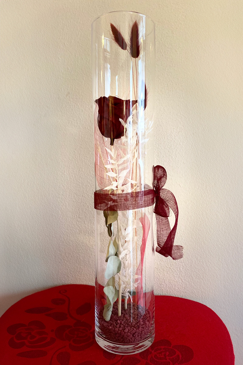Foto Cilindro in vetro (h cm50, dm 10cm) con rosa stabilizzata