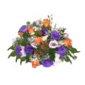 Centrotavola tondo con fiori freschi di stagione, con fantasia del fiorista.